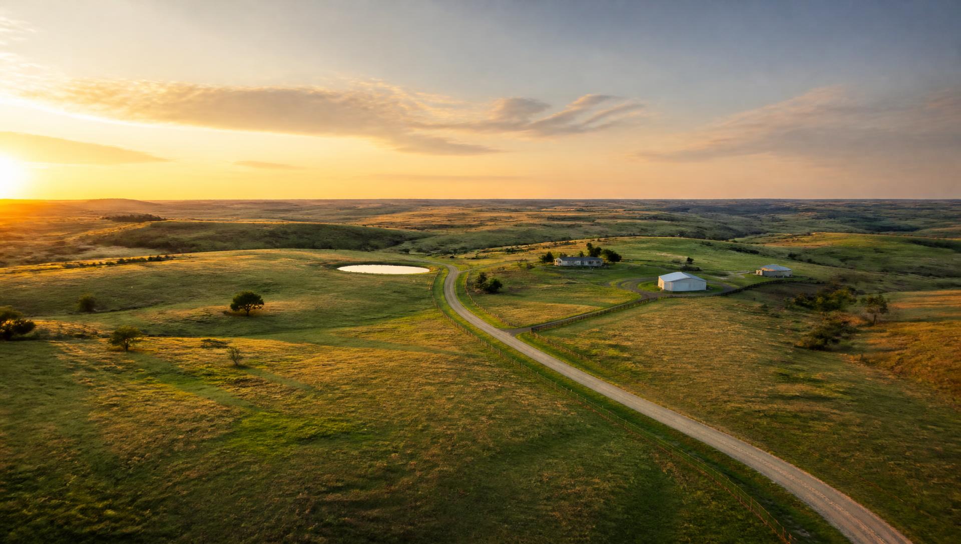 Aerial view of South Dakota ranch land and pasture for sale at sunset